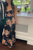I'm 5ft so I had to get the bottom cut, but the top part fits perfectly. It's a very lightweight and pretty dress - Liz L.