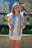 This is such a cute dress. I'm typically a medium but I sized up to a large because I saw reviews saying it ran small and it fit perfectly. I wore this to my graduation and loved the pearl accents on the straps! - Leah A.