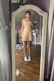 This dress is so pretty and looks just like the picture. I love the material and pattern. Not too short, appropriate for school and family events. - Ella T.