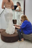 Came out perfectly for a petite bride, just long. I had to take it to the seamstress and it came out perfectly. Like a glove. We added a rhinestone belt from an online store. - Wanda M.