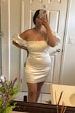 I loved it, the fabric is not transparent. The very first time I tried it on was with a black underwear and it did not peak through at all. Looks very formal and very pretty. I don't have bigger arms so the arm wraps slip off, nothing a bit of double sided tape couldn't fix though. Customer service was amazing. I initially ordered the wrong size but they allowed me to exchange it with no problem. The day I submitted the request is the same day they sent the new dress in the new size, even before I had the time to send back the original dress. Would definitely order from them again! - Dulce P.