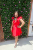 I recently purchased this stunning red dress during a sale, and I'm thrilled with my decision. After reading reviews, I decided to size up, and it turned out to be a perfect fit. Despite typically opting for a Medium in Lulus, I went for a Large with this dress, and it complements my 5'2, 144lb frame beautifully. The dress is not only cute and stylish but also exudes a flirty charm, making it versatile for date nights, events, or casual wear. Overall, a fantastic addition to my wardrobe! - Fatima G.