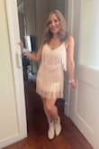 I recently wore this dress to a Taylor Swift concert in Lisbon, and it was perfect! It fits true to size and was very flattering! It's very well made, and I got tons of compliments at the concert. I am impressed by the quality and will definitely wear this again! - Melissa D.