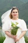 I was very worried because this adorable style of dress usually do not look flattering on my body type but I was very pleasantly surprised. I feel very cute and beautiful. This dress was for my wedding photoshoot after my elopement and was beautiful and casual. I look forward to using the dress more in the future. - Emily M.