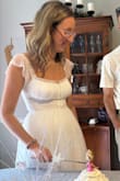 Wore for my wedding shower and felt so good in it!  Got lots of compliments!  I am normally a 4-6 and the small fit me perfectly!  Adorable dress! - Lee S.