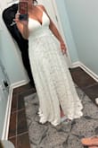 I tried on several different styles. Being short-waisted, it was really hard to find something that looked right on me. This dress is perfect; it fits (other than needing to be a little shortened), is fancy enough without being overboard, and is the perfect shade of off-white. The only thing is the straps are in a weird spot (as other reviewers have mentioned), but it doesn't bother me enough to have them moved. Lulus should maybe update the model picture so it's more accurate though. Can't wait to wear it for my wedding next month! - Heidi C.