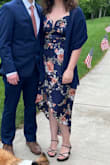 99% of the time when I buy a dress, I have to get it altered. This one blew me away with how perfectly it fit! It wasn't cut too high, and not too low. It was beautiful for a summer outdoor wedding. In terms of fit, it was also very comfortable. Not snug!! I was surprised at how flattering it was. I'm a little overweight right now and it laid perfectly, without showing fat rolls when I sat down or feeling like I was being squeezed. I didn't even need shapewear. BUY IT, LADIES. I'll be breaking this one out again for sure!! - Rachael B.