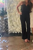 Loved everything about this jumpsuit. Initially, I ordered a size medium but it was a little big so I sized down to a small. Love the fit! I was able to wear a strapless bra with it as well. I made it pop a little bit with some pink heels and jewelry. Definitely want to order this in another color! - Kelly B.
