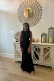 It fit my body just right. The back is beautiful! - Maddison B.