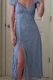 This dress seems to be good quality and the blue color is very pretty! I will say the seams under the bust area lay a little weird on me but the top part of the dress is adjustable so I might just need to re-tie the back straps. I love it though and can't wait to wear it for an upcoming wedding! - Anna L.