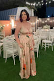 This dress is really beautiful and has a very good quality fabric. According to the size chart, I ordered an XL at first but it was too large in the bust area. So I exchanged it for a size L which is my usual size and it fits perfectly. I did the 3-day delivery, and both times I got the dress in one day. - Shadi M.