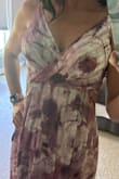 I love this dress, cute and comfortable, but the flower pattern placement is unfortunate. The large flower over the left breast is very noticeable. Needless to say, I didn't wear it to the wedding! Will return it if I can't find a way to alter it. - Lisa H.