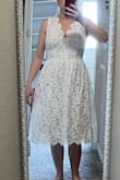 This is a perfect, classy, elegant dress. It's girly and modern at the same time. I wore it for a religious ceremony and got lots of compliments. No need to worry about the cleavage or the length. Very proper for the occasion. - Daniella M.