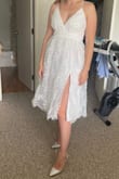 I think this dress is beautiful! I am 34C and 144 lbs, first time I ordered a medium size but it was way too big. Small fits really well and I think it's a great reception dress. - Magda D.