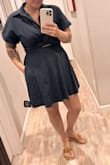 I don't like posting pictures of myself but after having to adjust to my new body after having a baby I have found it hard to see what clothing looks like on a body type like mine, so hopefully this is helpful for someone! I really like this dress, it's classy, lightweight, the A-line hides any mommy pooches, pockets are a major plus. I think you could dress this up or wear it casually. I'm wearing it to a semi-formal summer wedding. It keeps my chest covered but not too boring. This picture is fresh out of packaging so the garment will need to be steamed but that's not uncommon. I would recommend this purchase, seems to look nice on all sizes. Elastic in the back gives you some wiggle room, I would say fits true to size. Some reviews said material feels cheap, so I was apprehensive, but it doesn't to me, skirt is lined and I can wear it with a normal bra. Mom body approved. - Jacqueline T.