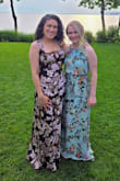 I LOVED wearing this dress! I needed a formal dress for a wedding in which my husband was a groomsman, and my son was the ringbearer that matched their tuxes. I also needed to feel supported and to be able to move comfortably while carrying around my 10-month-old without fear of the fabric being too delicate. This dress checked all my boxes! The fabric has a subtle but pretty shimmer to it that really elevates the look. The pleating on the bodice hid my little mom tummy nicely, and the square neck was elegant yet durable to my baby tugging on me all night. I did have a few alterations made since the dress came in very long. I also have a short torso, so I had the waistline taken up a bit for a nicer fit. The slit in the dress does open pretty high so I had that sewn to open just above my knee. Otherwise, I would have easily flashed the crowd. I purchased the dress on sale so spending a little extra on alterations to get this look just right. Was worth it! - Micaela H.