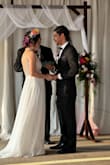 I bought this dress for my daughter for her wedding dress and she looked beautiful! We loved the open back, all the pearl and shine detail, and how it flowed. We had to take up the straps and it needed to be hemmed but she is  5'0 so that was to be expected we just didn't have time to hem it. - Sandy R.