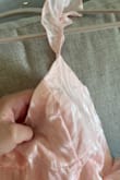 Dress was shipped to me with a rip on the top. I have to get this altered for a wedding so I don't have time to exchange it. Overall, quality isn't the best, loose strings all over the dress. - Brooke P.
