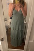 Love this dress, super comfortable. The backless element makes it a bit sexy. Top size was perfect for a C cup, but I think if you had much larger boobs than a C/D, you'd be falling out. Love it, perfect safe dress for a wedding - Blair D.