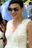 I wore this dress to my son's college graduation and got so many compliments. It's gorgeous and fits perfectly. I love that it has pockets. I needed to quickly shove my phone in the pocket and help grandparents, and it made it so easy to wear all day. I love the fit and flare style as well. I ended up removing the netting on the inside because I like a slim look, but it was so easy. - Manoo D.