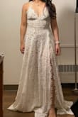 I love the way the fabric moves and the sexy slit, but the waist was a little too low for my long torso. The chest area is too loose for me. Wanted to love this and use it for my wedding because it looked so beautiful on both models from the photos but sadly it didn't fit me as well. - Dawn L.