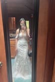 Out of all the dresses I have tried, this one looks I like the most, especially for the color Champagne undertone and not too long of a train. I will definitely shorten the sleeves. Overall, love love it. - Nhu D.