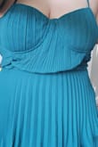 Really wanted to love this dress. The color was great and it looked cute except the bodice part! There was extra fabric that made it poof out and I have a bigger chest so the cups lay kinda weird. - Chen-Marie P.