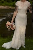 This dress surprised me! The fabric is actually quite comfortable and stretchy, and fit my body so well. I only had to get an inch or 2 hemmed as I was wearing sneakers for my elopement. If I was wearing heels, I may not have even needed to hem it! The only downside is that it's pretty difficult to get out of - there is only a side zipper on the top to the armpit, so it's hard to wiggle your arms out and get it off. Despite that, it was perfect for my private elopement! - Elise C.