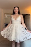 This dress is stunning and fits like a glove! I am on the shorter side and the length is a little below mid thigh(see pictures). Straps are adjustable. One note for the bustier girlies like myself, this dress offers a lot of support, but with that comes a decent amount of cleavage! I can't wear this to my bridal shower because of that, but am saving it for my bachelorette! - Margaret O.