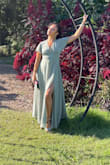 Excellent feel. Not too tight. I did have to get it hemmed, but I am a short gal. The dress is light and easy to wear. Lots of compliments! - Michele B.