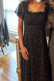Dress arrived on time, cute, in great condition besides a few long threads hanging off that I had to cut. I ordered a small since I normally wear small/medium shirts but it was a bit large in the shoulders, chest, and waist. I could probably fit into the XS but I'd rather have it larger than smaller! - Lindsey V.