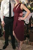 This dress fits like a glove! I bought a small one and it fits perfectly. I am a size 4. Be careful if you have a large chest...you may have a peek-a-boo situation where the top crosses. I wore petals! The material was thick. Definitely recommend! - Page D.