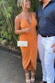 Loved this dress super comfortable and form fitting. Low cut in the chest but has adjustable straps. It is very stretchy I had a medium but think a small may have worked too - Pat H.