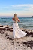 I loved this dress for my bachelorette party in Mexico! It was the perfect length and the material is very nice. - Adrienne P.