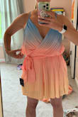 I love the colors on this romper but it's just not made well. The inside lining shows on the sides of the chest and it weirdly blouses out at the waist. Sadly returned it - Valerie G.