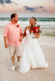 The dress fit perfect. We had a beach wedding and the way it caught in the breeze was absolutely gorgeous. I could not have been any happier. - Kimi P.
