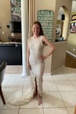 It is perfect for my beach wedding. Just a little tight in the back but I'll cut back in the weights for the next 2 months. - Karyn C.