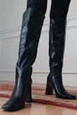 I am usually a size 8 for shoes. But I decided to size up and get 8.5. Best decision I made. It fits perfectly. There is enough room if I want to wear thicker socks or wear the boots over a pair of jeans. The material both outside and inside are soft. There is slight padding on the insoles that provides some comfort. But after 3+ hours of standing and walking, the padding wore down a bit and my feet were aching a bit. - Sharon V.