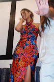 I wore this to a destination wedding's welcome party. I got SO MANY COMPLIMENTS. I needed some boob tape to make sure I didn't pop out on the sides... but seriously this dress is incredible. - Callie I.