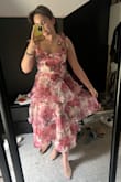 The dress is cute, summery, fresh, light, and very elegant! I love the 3 layers and the corset. It's pretty flat on the chest, so I sewed in a bra. I'm ready for my best friend's wedding - Julia T.
