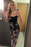 I bought this dress for my cousin's wedding and was a little disappointed because of the embroidery in the top corner that wasn't pictured online. I LOVE the bottom of the dress but not really a fan of the top because of that added detail, the bottom embroidery doesn't transition well into the top either in my opinion. Overall the dress is still cute, I just like the one pictured online better than what I received. - Danielle M.
