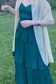 I got this for a semi formal wedding and it worked out perfectly. Could be dressed up or down depending on accessories. It was a bit longer than I expected falling at the lower shin, but it worked out because it was a conservative event. The color was beautiful! - Tim A.
