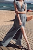 I needed the tallest heels to wear this but it was perfect for a beach wedding - some double sided fashion tape for the plunging neck is helpful to avoid any unwanted angles of cleavage. - Ciera K.