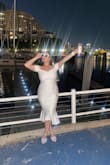 I bought this dress for my rehearsal dinner and it was perfect! A size L fits great, maybe even slightly loose, but I recommend wearing shapewear underneath if you don't want your belly button and underwear lines to show.  Although the fabric is thick and does not feel cheap, it still shows your bumps and curves, so I wore it with shapewear smoothing shorts and a strapless bra. - Christina G.