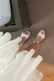 These shoes are literally so gorgeous and fit perfectly! However, they are not the comfiest. The bottoms do not have any kind of traction to them so I found myself slipping and tipping over in them. I also have blisters around my ankles from the straps. - Saoirse B.
