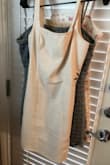 I had to order a size up to zip over my chest and to get it taken in around waist.  It's so perfect - Jennifer G.