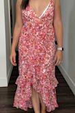The floral and colors are beautiful. The fabric doesn't give off cheap vibe it's a good texture. However, I had to get it tailored on the top part of the dress because the breast size they imaged for size large is way too big. After getting it tailored it was perfect - Taylor H.