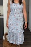 The color, fabric, and floral are beautiful. However, compared to other large size dresses I have ordered from Lulus this one runs a bit tighter. - Taylor H.