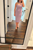 The dress is super cute and comfy! The strap is a little loose but otherwise perfect! - Hannah M.