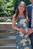 I wore this to a wedding while 6 months pregnant and it was very comfortable and flattering! I sized up because of the baby belly but this dress fits true to size in my opinion. Highly recommend as this is a perfect dress for a summer event! - Emily D.